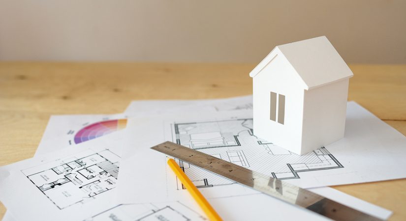 blueprints and house figurine should you remodel projects that hurt home value