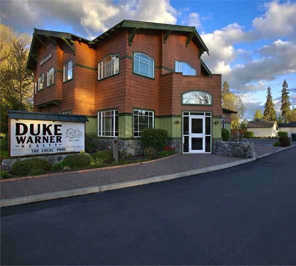 Duke Warner home in Bend Oregon with a for sale sign