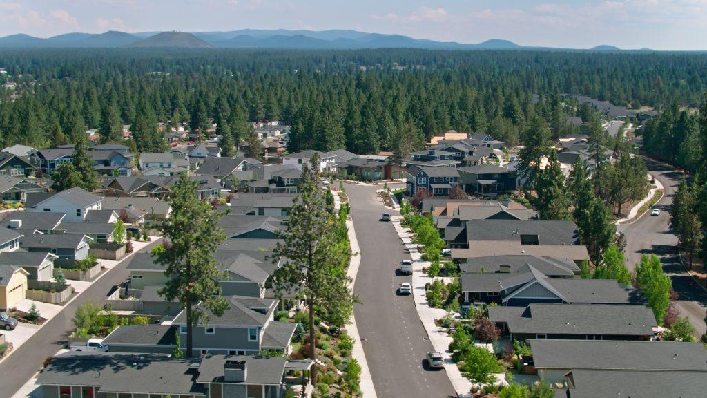 Aerial view of a suburban neighborhood in the Old Farm District in Bend, Oregon. move to Bend Oregon